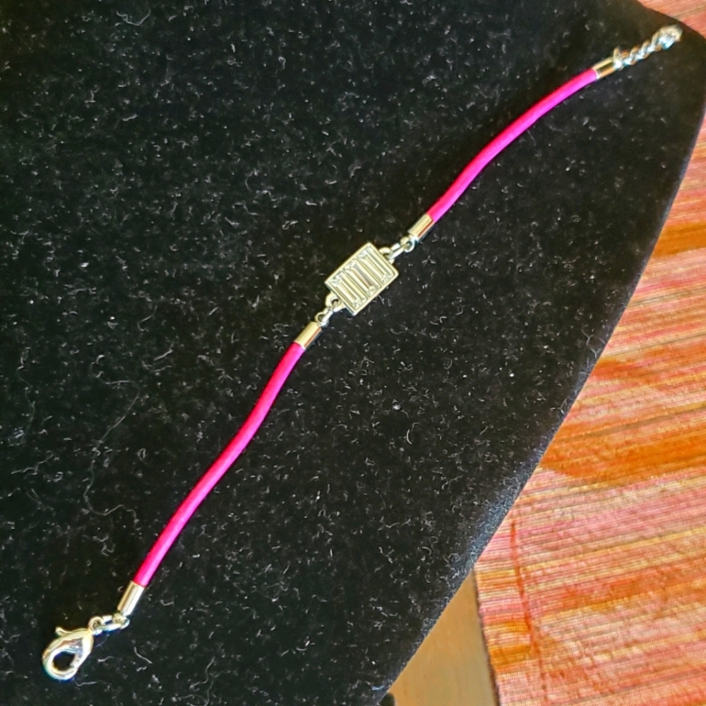 Lia Sophia silvertone crystal pink cord bracelet